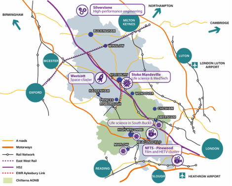 Map of South East England showing locations of proposed HS2 stations, major cities, airports, A roads, motorways, and rail networks.